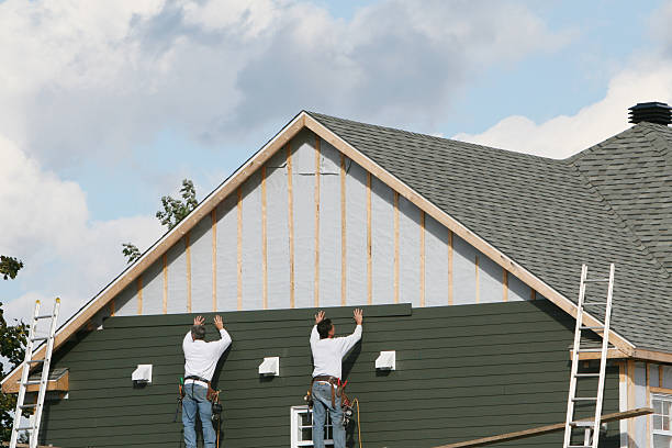 Professional Siding technician working in Dayton, NJ